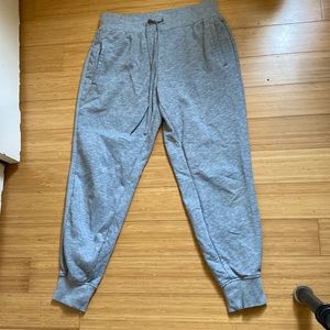Grey track pants